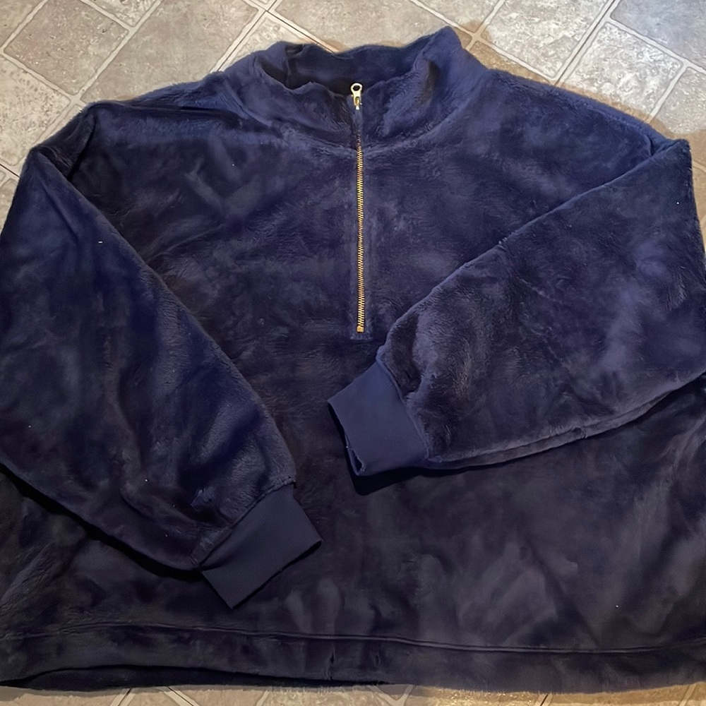 no cuts/rips, not torn, used but looks like new, very fluffy, not dirty, clean;